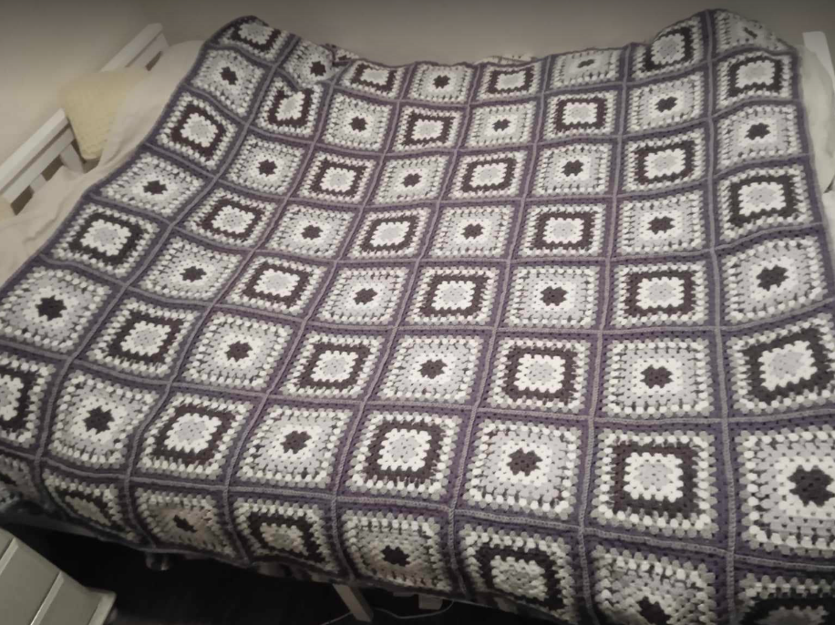 Brown crochet blanket with granny squares
