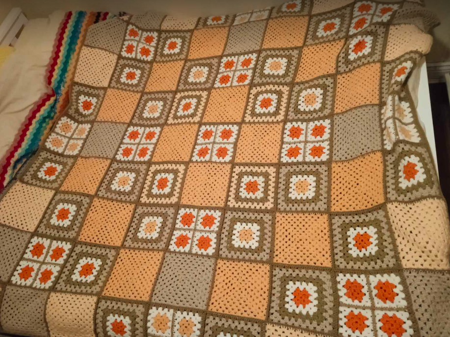 Brown crochet blanket with squares